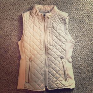 Cream colored light puffer vest